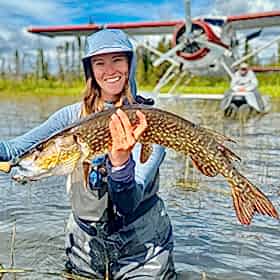 Woman holding fish