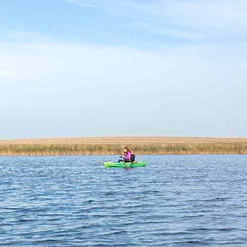 man kayak fishing